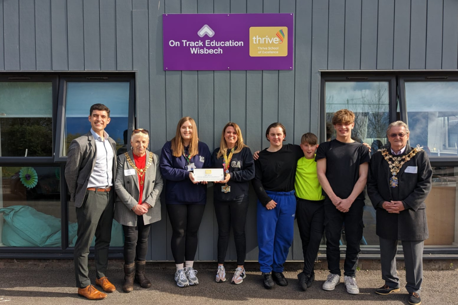The Team at On Track Wisbech receiving their Thrive School of Excellence award